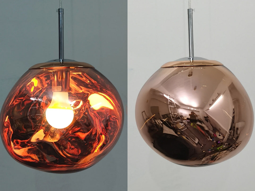 Rosegouden moderne LED hanglamp Lumaé, perfect voor de eetkamer. Creëert een warme, luxe sfeer.