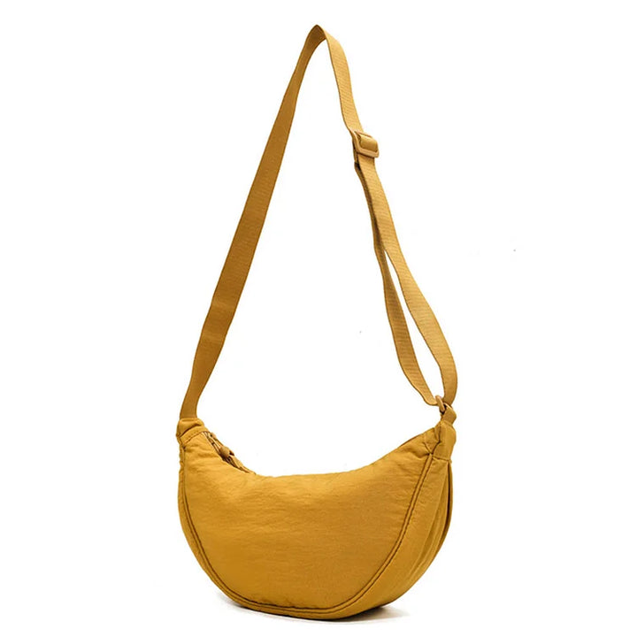 Praktische crossbody dumpling tas voor vrouwen, ideaal voor onderweg en een lichtgewicht gevoel.