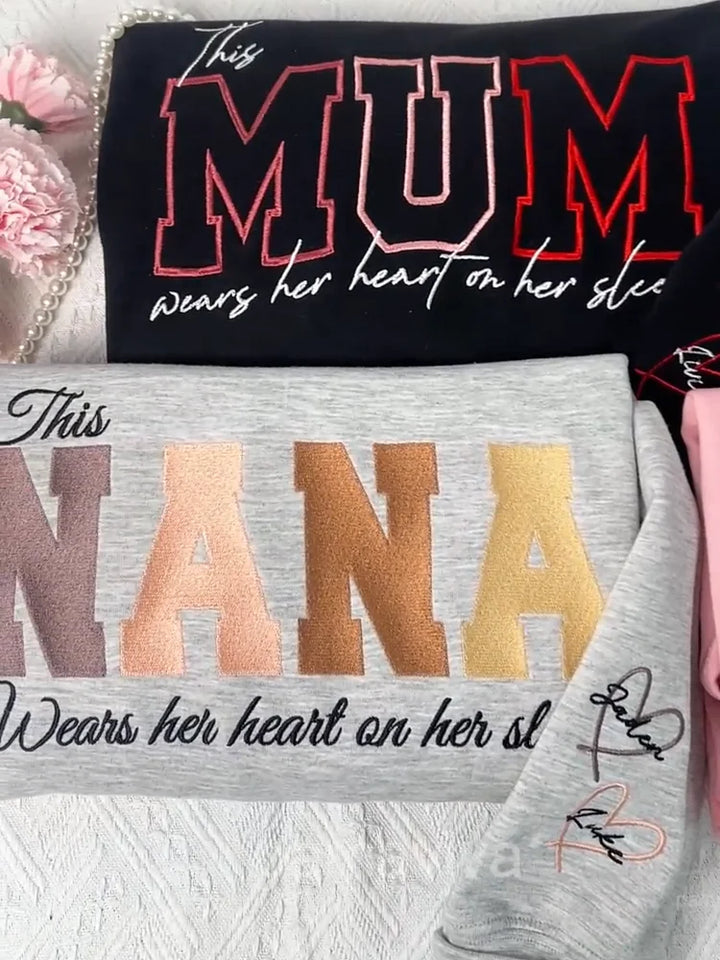 Geborduurd sweatshirt, cadeau voor oma, met namen die warmte en genegenheid geven.