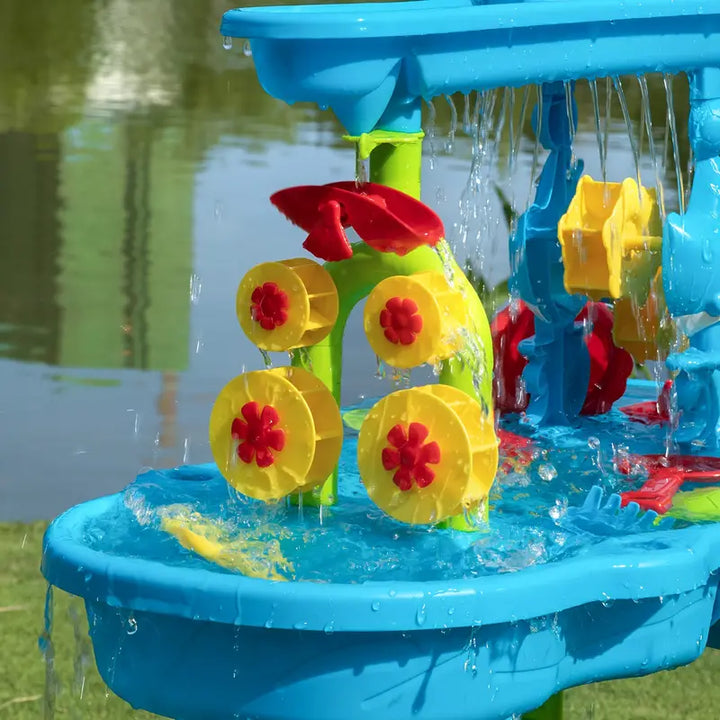Educatieve kinderspeeltafel met drie compartimenten voor zand en water, stimuleert creatieve ontwikkeling.