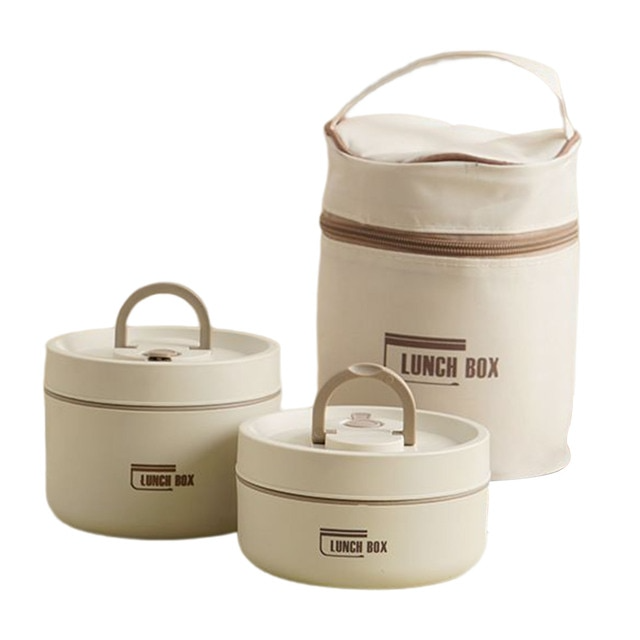 Hand draagt de Isobox™ geïsoleerde lunchbox in de draagtas, licht en makkelijk mee te nemen.
