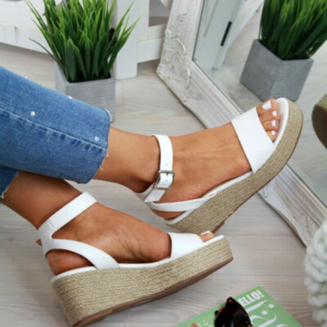 Witte dames espadrille sandalen met comfortabel platform, perfect voor een frisse zomerstijl.