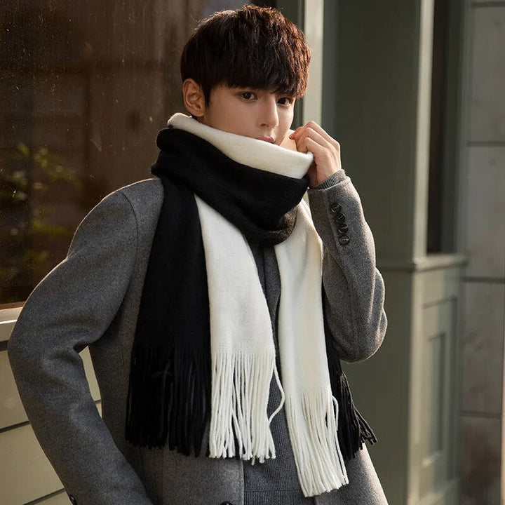 Stijlvolle unisex kasjmier sjaal met kwastjes, een modieus en zacht winteraccessoire voor iedereen.