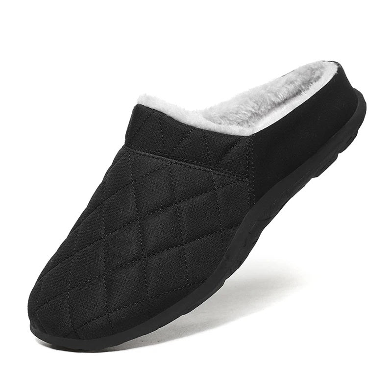 Stijlvolle heren winterpantoffels met zachte voering en stevige antislip onderkant.