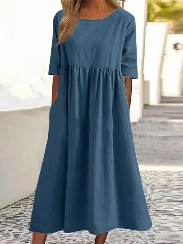 Frisse katoenen zomerjurk voor vrouwen, casual midi lengte en korte mouwen. Perfect voor warme dagen.