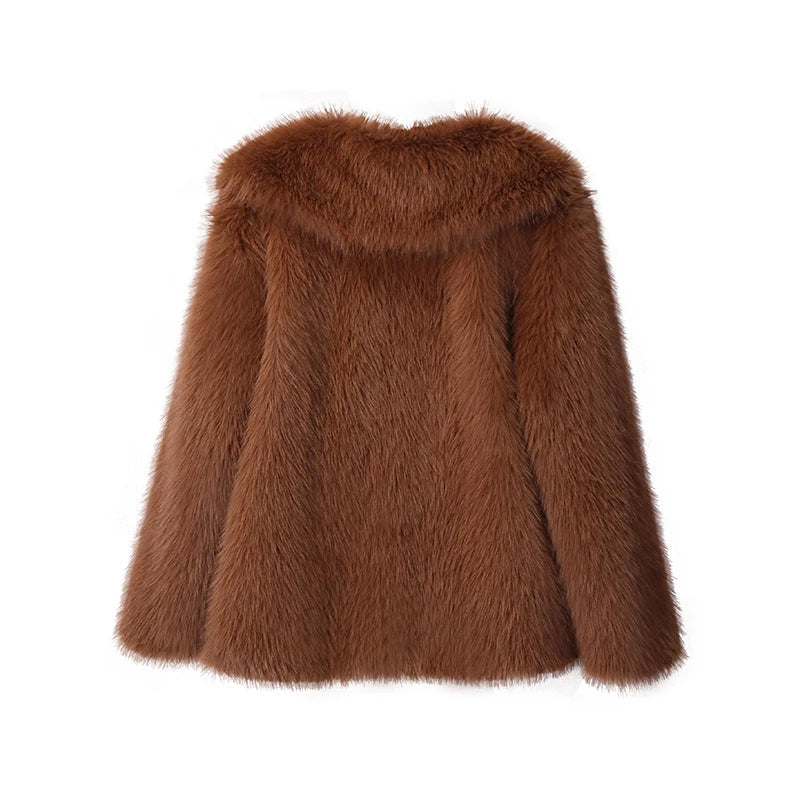 Heerlijk warme pluizige damesjas, oversized en trendy, perfect voor koude winterochtenden.