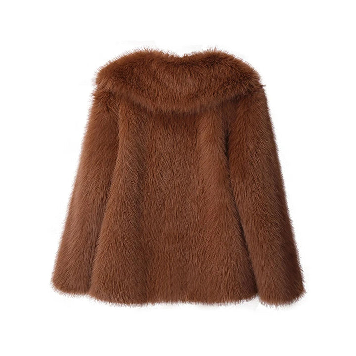 Heerlijk warme pluizige damesjas, oversized en trendy, perfect voor koude winterochtenden.