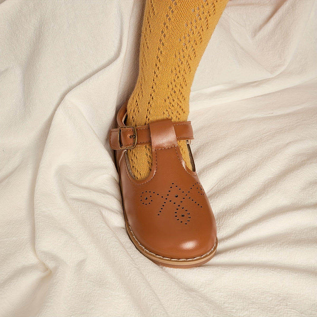 Detail anti-slip zool op vintage platte meisjes schoenen, zorgt voor veilige grip en extra comfort.