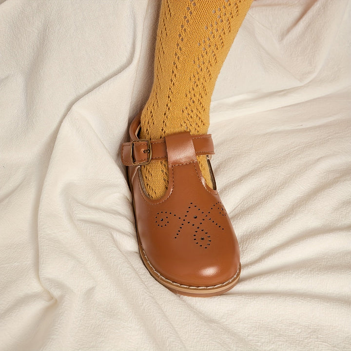 Detail anti-slip zool op vintage platte meisjes schoenen, zorgt voor veilige grip en extra comfort.