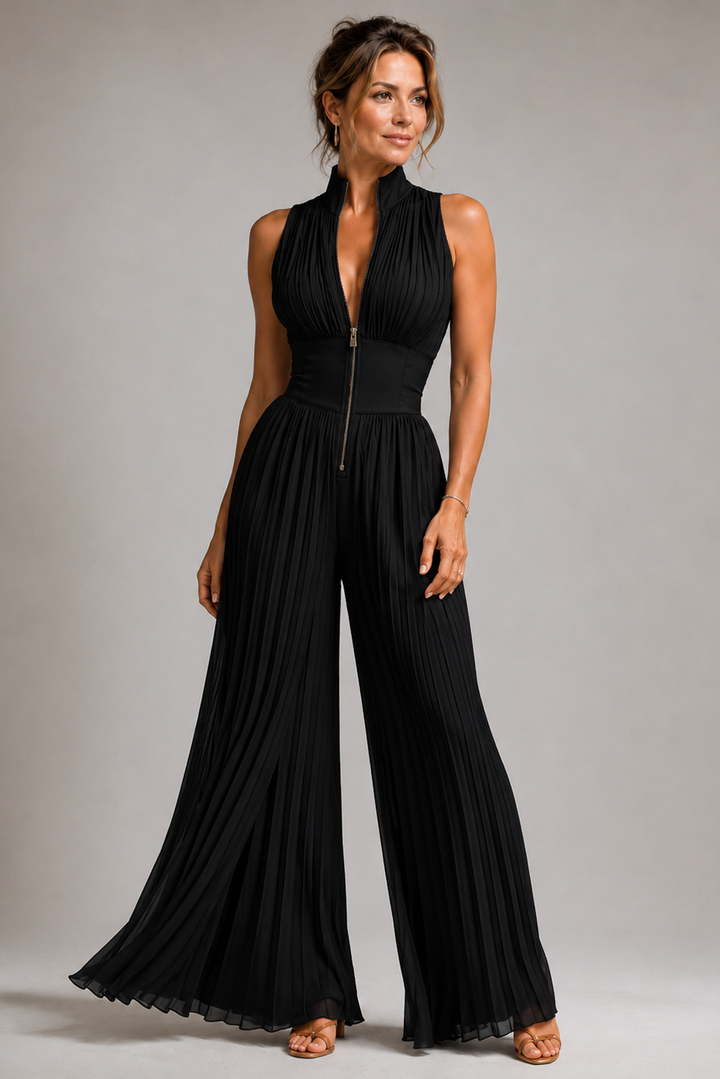 Vrouwelijke geplooide dames jumpsuit met wijde pijpen, accentueert elegantie en comfort voor elke gelegenheid.