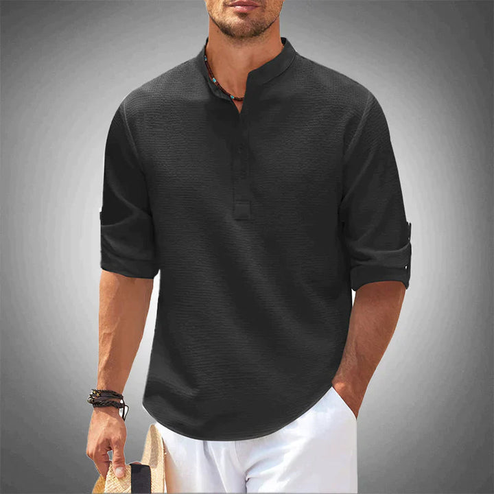 Comfortabel ademend herenoverhemd, ideaal voor warme zomerdagen. Een veelzijdige casual look voor mannen.