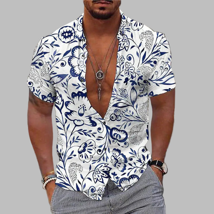 Casual heren zomeroverhemd met kleurrijke bloemenprint en korte mouwen, perfect voor strand of vakantie.