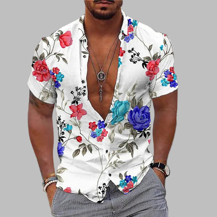 Trendy herenoverhemd met opvallende bloemenprint, ideaal als casual overhemd voor de zomer of strandkleding.