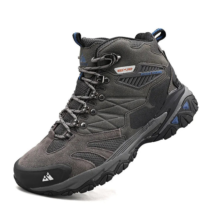 Heren waterdichte wandelschoenen grijs, hoogmodel, bieden duurzaamheid en comfort voor trekking.
