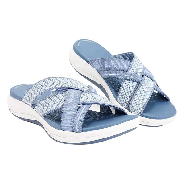 Detailopname van de Lina dames slippers, pronkend met het orthopedisch, schokabsorberend voetbed.