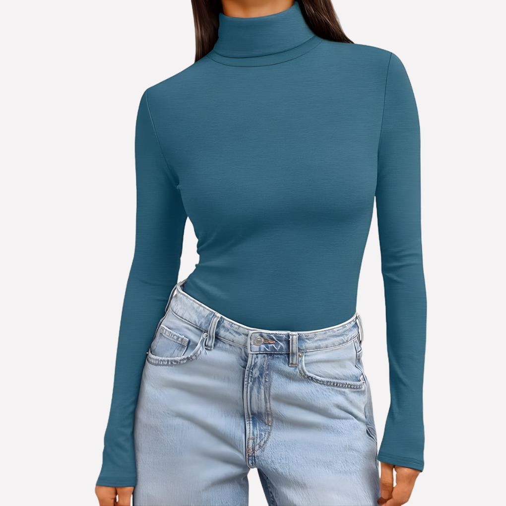 Veelzijdig dames shirt met coltrui, geschikt voor zowel casual als geklede outfits.