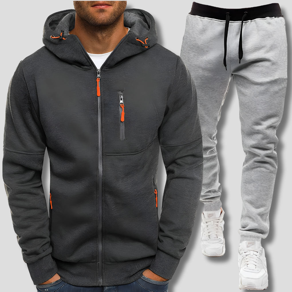 Modern heren trainingspak, bestaande uit comfortabele pullover en broek. Stijlvolle sportkleding en vrijetijdskleding.