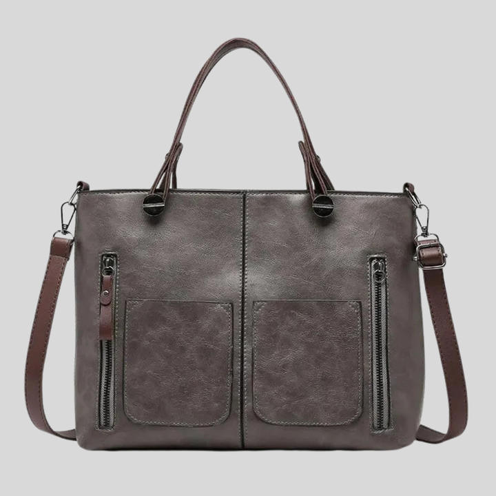 Klassieke bruine dames leren schoudertas van echt leer. Praktische handtas met verfijnde details, perfect accessoire.