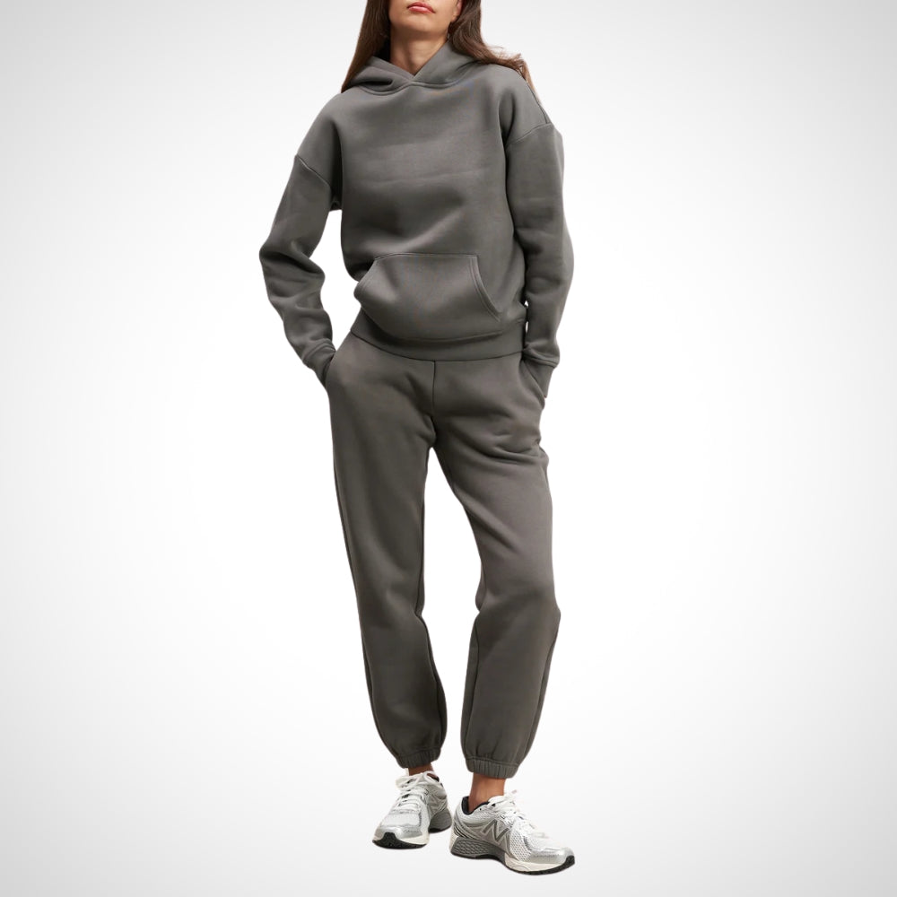 Zacht katoenen dames trainingspak. Een comfortabel joggingpak met hoodie en broek, ideaal voor sport en ontspanning.
