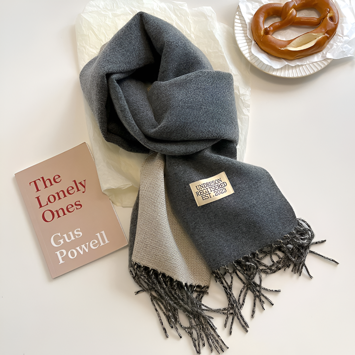Heerlijk warme wollen sjaal met subtiele franjes, perfect voor dames tijdens de koude wintermaanden.