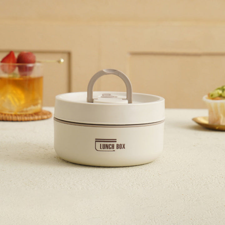 Interieur van de geïsoleerde lunchbox, toont hoe compartimenten eten warm en gescheiden houden.