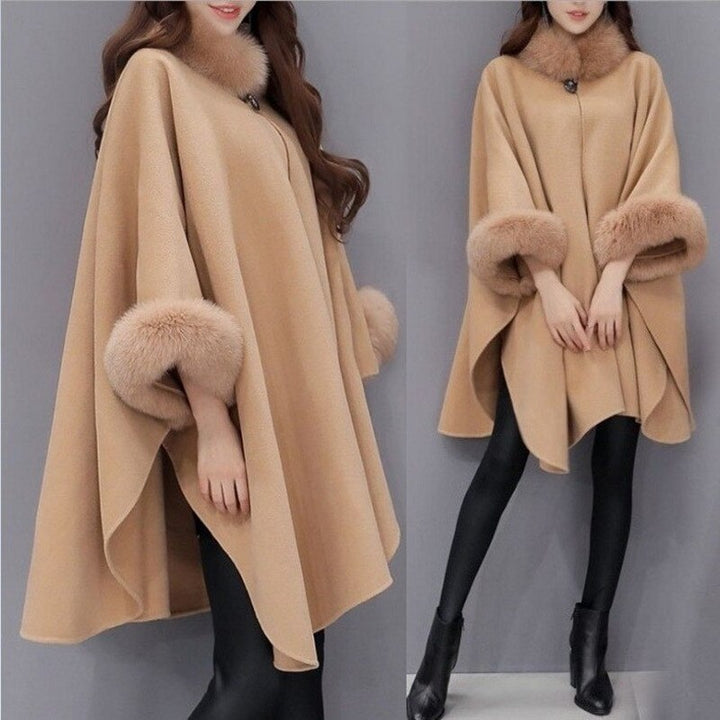 Verfijnde dames winterjas met comfortabele losse pasvorm en luxe bontafwerking. Stijlvol en warm.