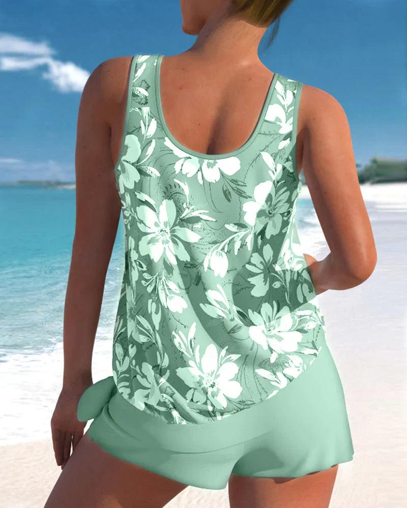 Grijze tweedelige dames tankini met stijlvolle top en boyshorts. Perfecte zwemkleding voor zomer, strand en zwembad.
