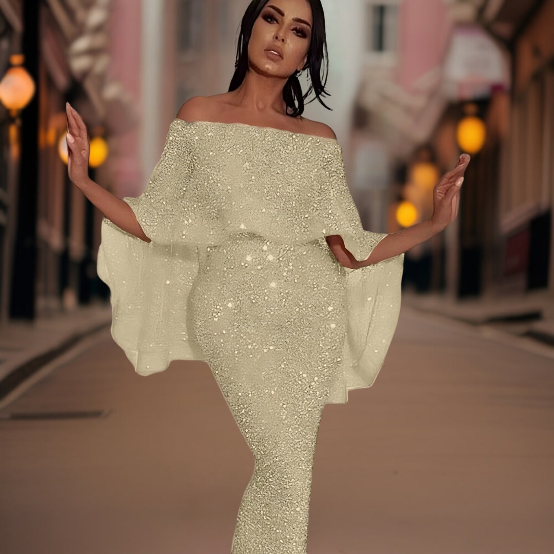 Stijlvolle lange dames off-shoulder jurk uit de nieuwe collectie. Ideaal voor formele gelegenheden & feesten.