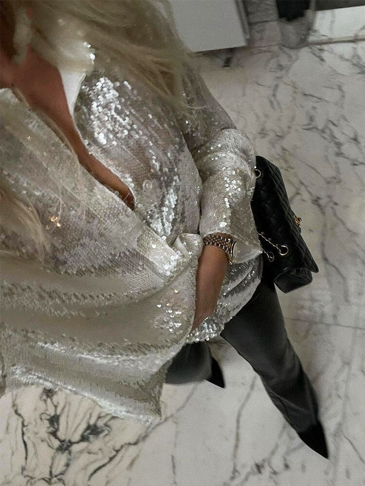Comfortabele oversized blouse voor dames met elegante glitter, perfect voor modebewuste vrouwen in lente & zomer.