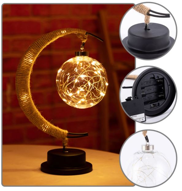 Luna nachtlamp op een nachtkastje, een draadloze LED sfeerlamp van ijzer die elke slaapkamer verfraait.