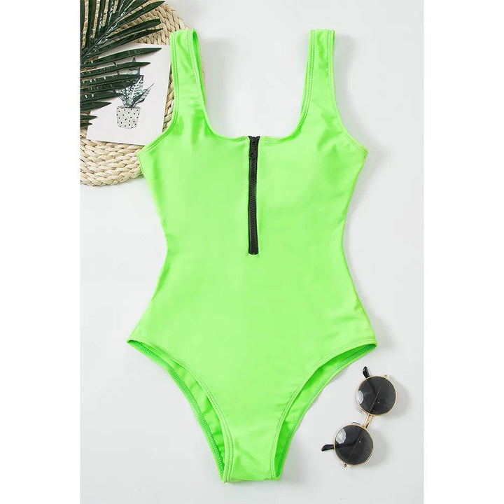 Dames badpak met rits, effen design. Stijlvol en veelzijdig voor jouw zomeravonturen.