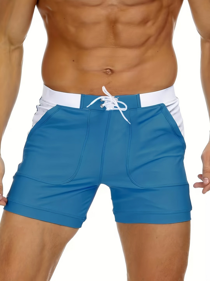 Praktische heren zwemshort Elias. Sportieve, sneldrogende zwembroek met ademend design voor actieve zomer- en stranddagen.