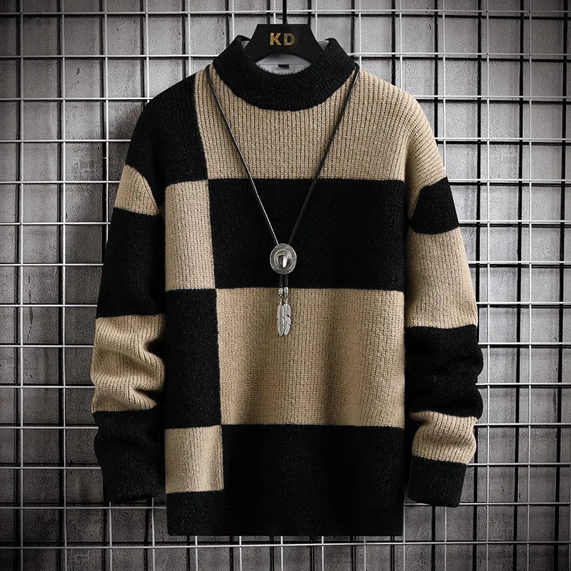 Loose-fit heren trui met geruit patroon en stijlvolle kleurvlakken. Perfect voor winter.