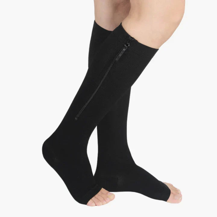 Ademende unisex compressiekousen met rits en teenloos design voor langdurig comfort en ondersteuning.