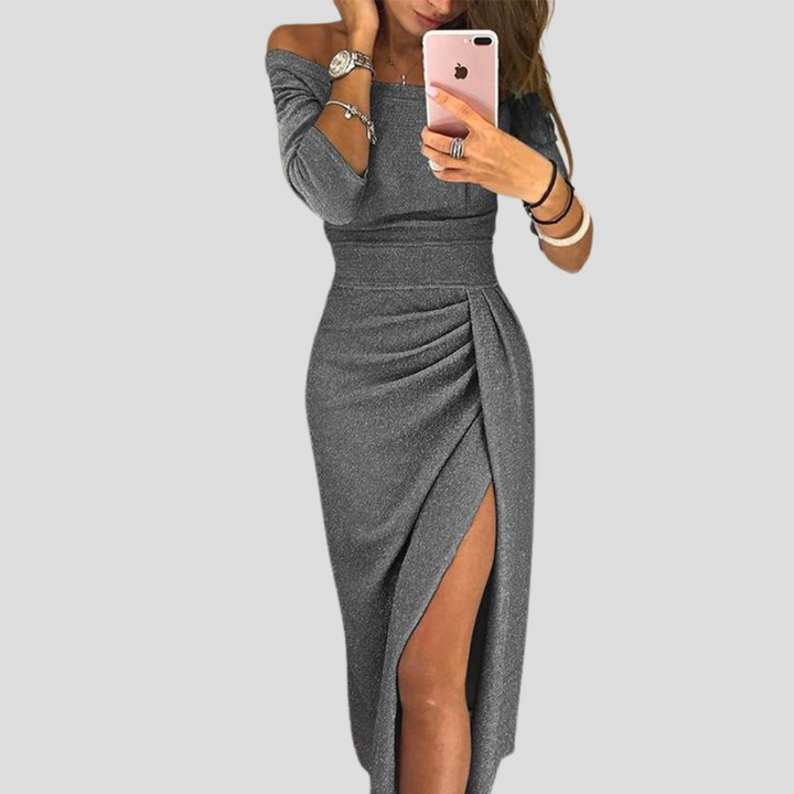 Stijlvolle damesjurk met knielengte, elegante pasvorm en functionele zakken. Geschikt voor casual en chique.