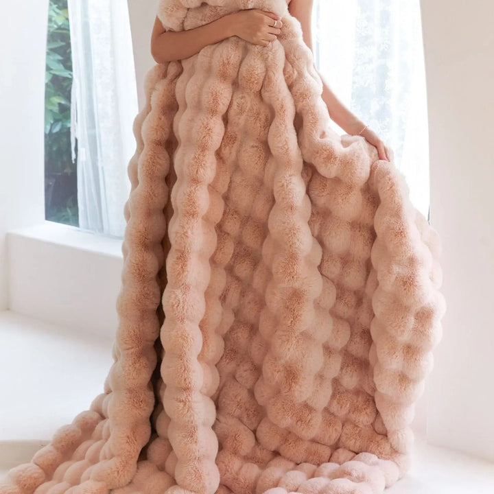 Luxe pluche woondeken, superzacht fleece voor extra warmte en stijlvolle interieurdecoratie.