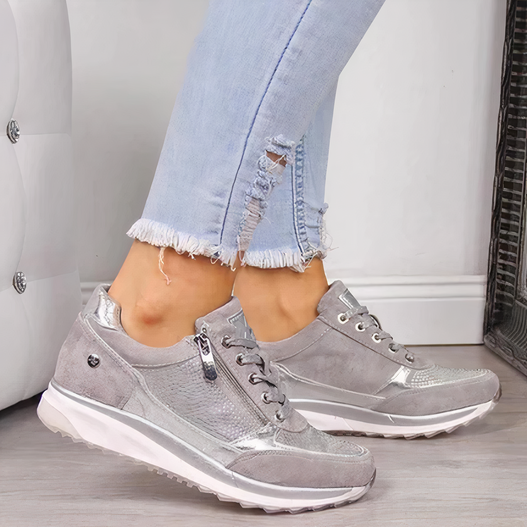 Comfortabele dames sneakers met praktische ritssluiting en veters. Ideaal voor dagelijks casual gebruik en wandelen.