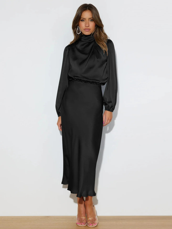Dames lange feestjurk van glanzend satijn, perfect voor gala of formele gelegenheden. Elegant en comfortabel.