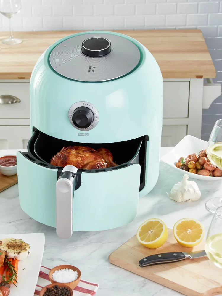 XL mintgroene airfryer voor familie maaltijden. Grote heteluchtfriteuse voor gezond koken zonder olie.