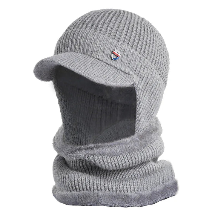 Trendy herenmuts, gebreid, met klep. Perfect voor winterkleding en een stijlvolle look.