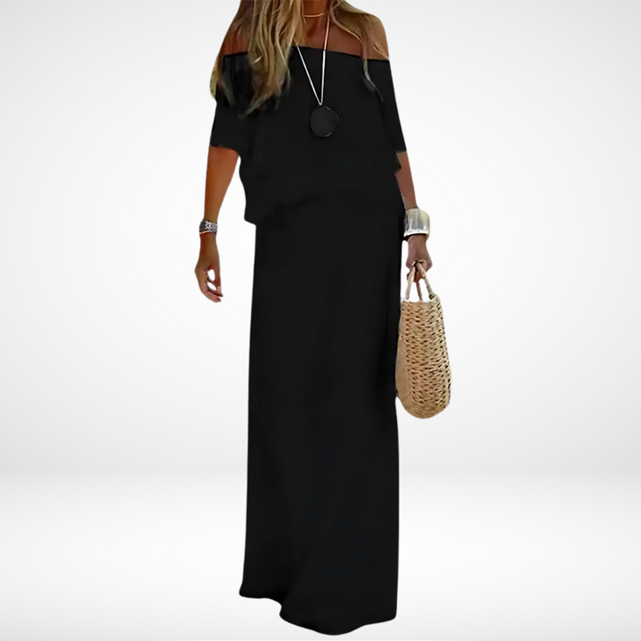 Lange off-shoulder strandjurk voor dames. Luchtig en elegant, perfecte maxi jurk voor zomerse dagen en vakantie.