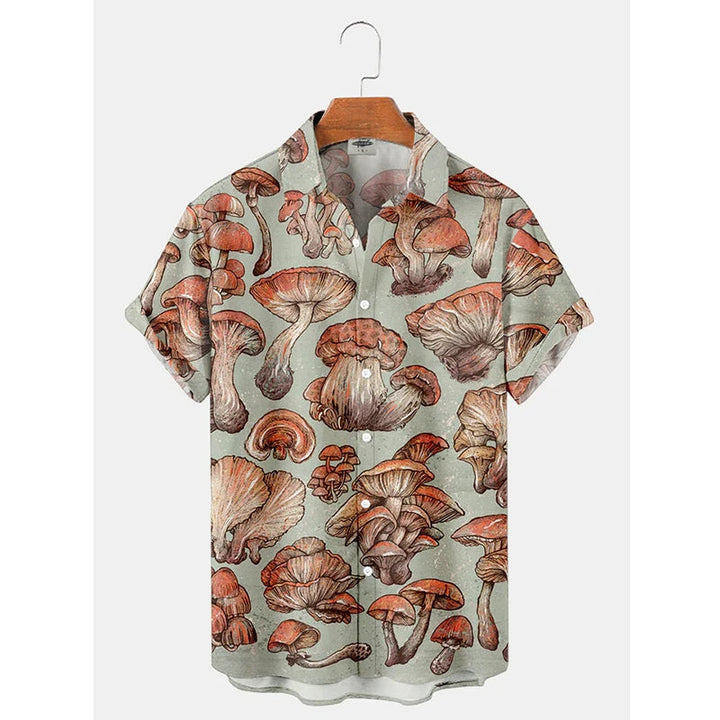 Stijlvol heren print shirt met exotische tropische bladeren, ideaal voor een casual zomerlook of strandvakantie.