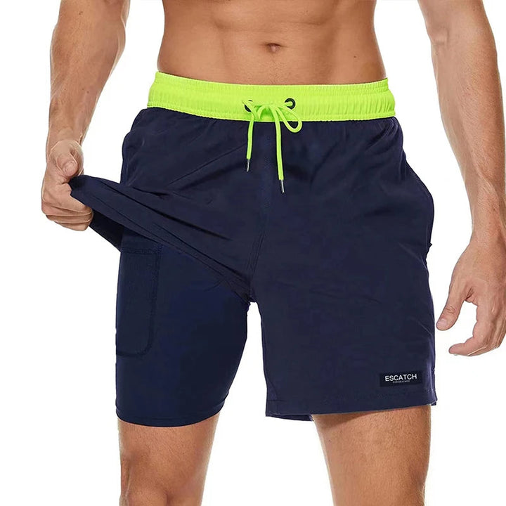Zwarte heren zwembroek met ritssluiting, sneldrogend, geschikt voor zomerse strand- & sportactiviteiten.