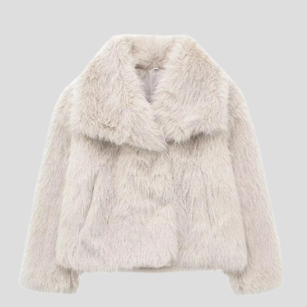 Elegante dames winterjas van imitatiebont, biedt warmte en stijl voor koude dagen.