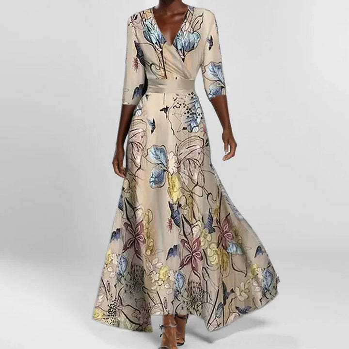 Elegante A-lijn maxi jurk voor dames met een diepe V-hals, modieuze print en discrete zijzakken.