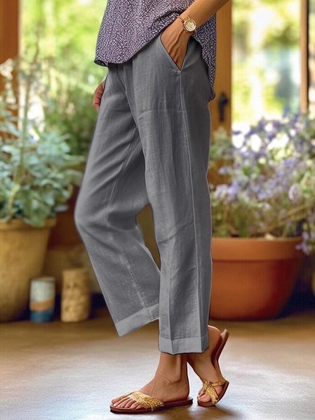 Damesbroek van luchtig linnen met hoge taille en praktische zakken, voor een relaxte maar stijlvolle look.
