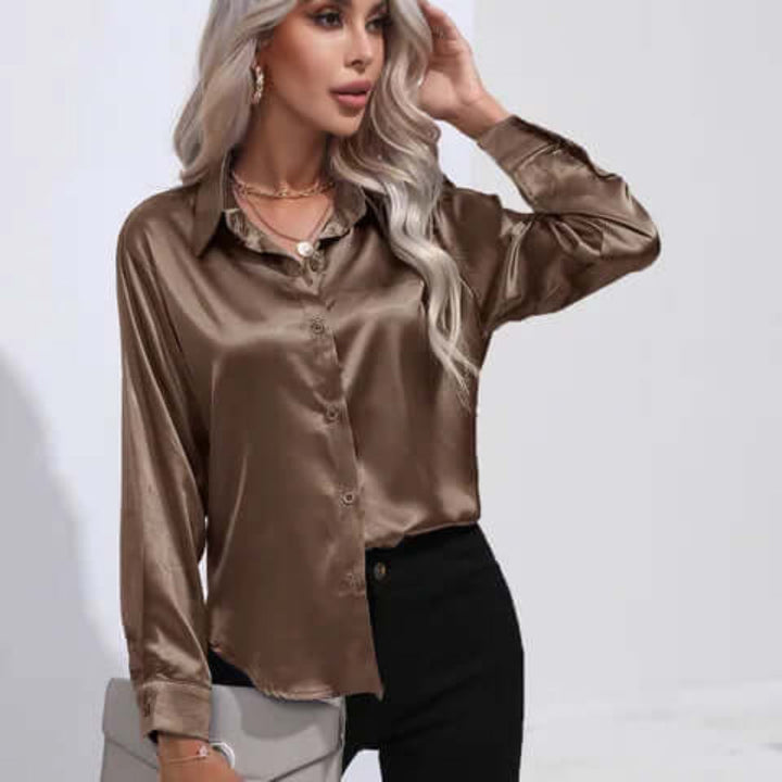 Elegante glanzende dames tuniek met lange mouwen en losse pasvorm, ideaal voor een stijlvolle look.