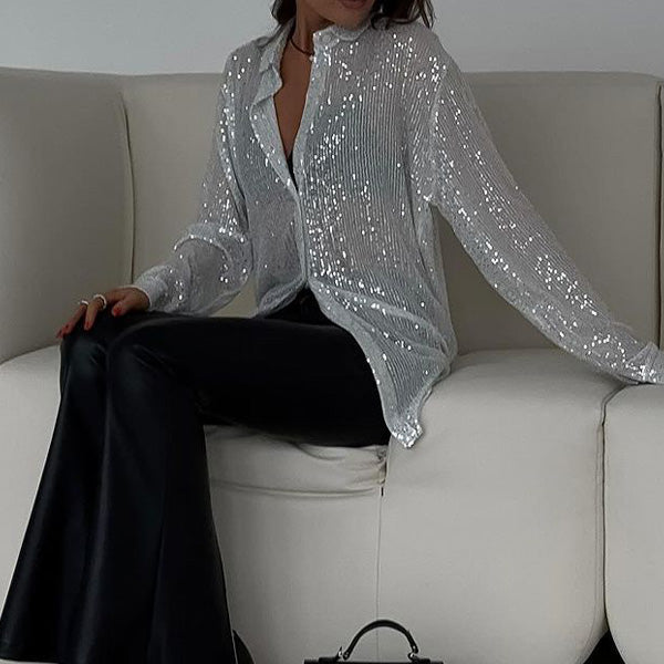 Elegante feesttop met glimmende pailletten, losse pasvorm, ideaal voor avondkleding en comfortabel.