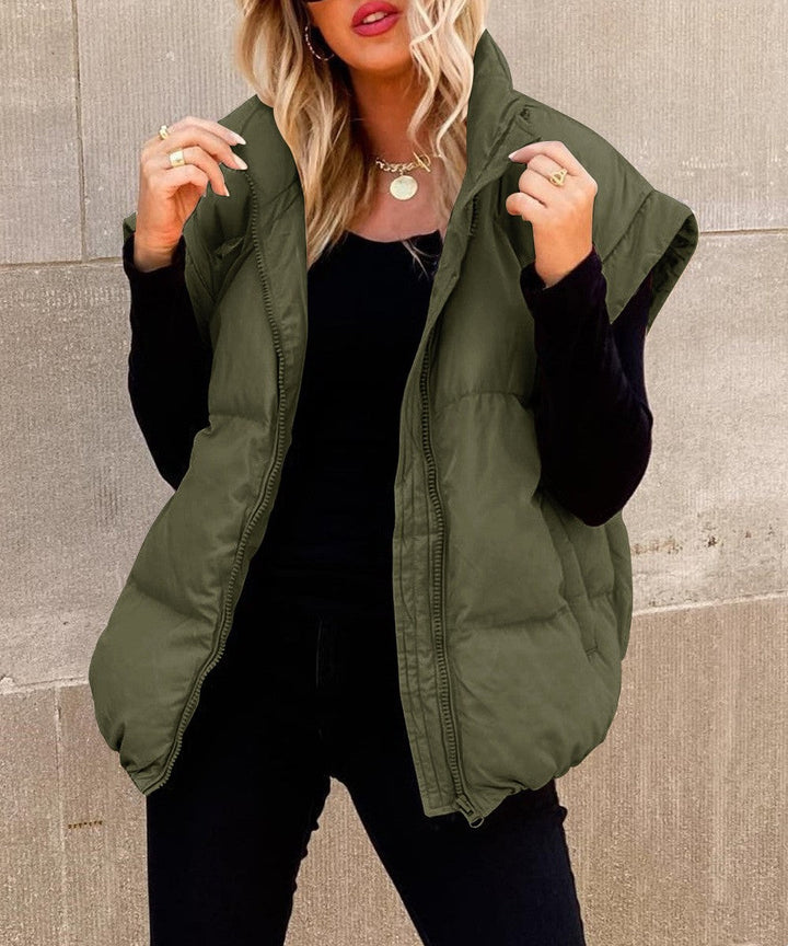 Modieuze oversized bodywarmer voor dames. Heerlijk voor laagjes, zacht en comfortabel. Een must-have voor wintermode.