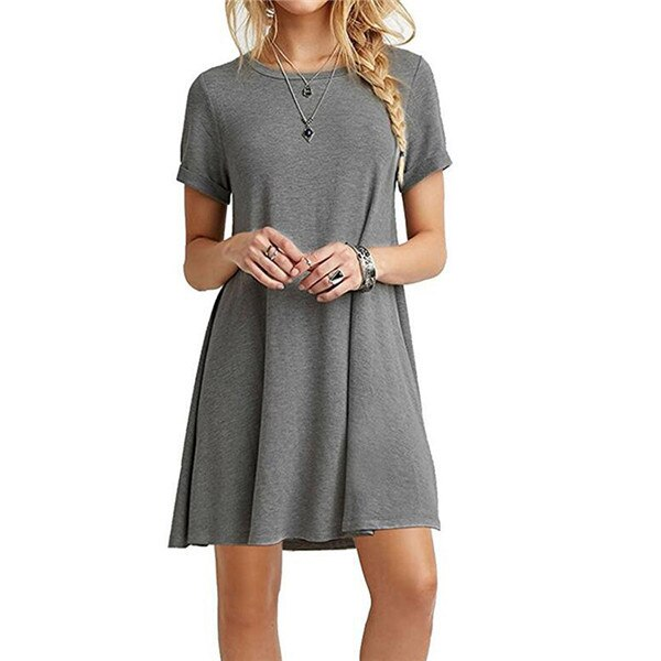 Modieuze effen damesjurk, stijlvol en comfortabel voor zowel casual als geklede lente/zomer outfits.